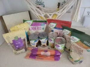 Healthy whole foods including quinoa, rice, beans, and nuts – how to eat healthy without dieting.