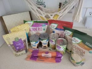 Healthy whole foods including quinoa, rice, beans, and nuts – how to eat healthy without dieting.